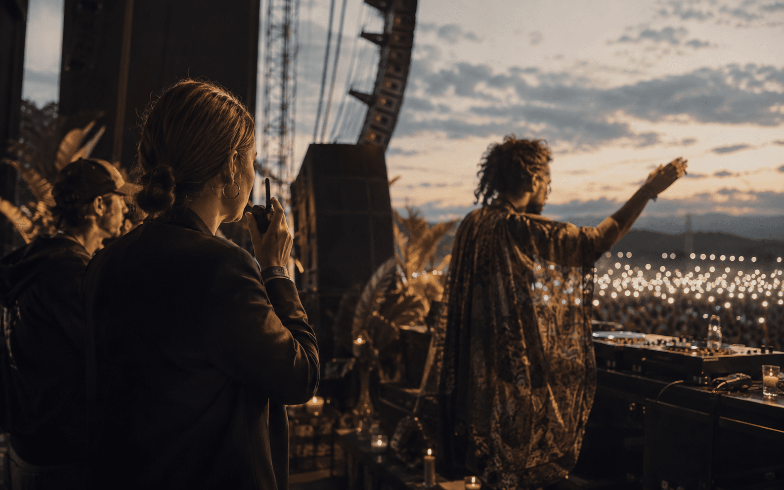 Artist performing while a booking team coordinates a live opportunity